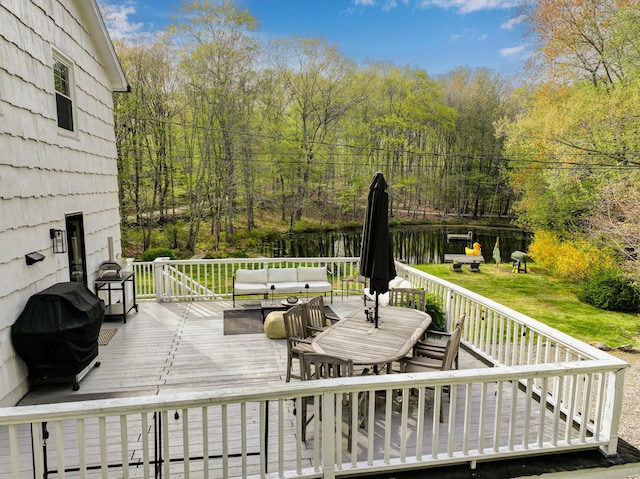 deck featuring an outdoor hangout area, outdoor dining space, and area for grilling