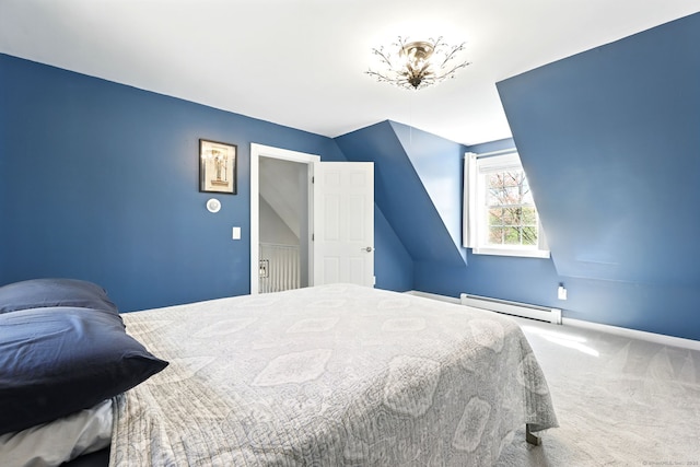 carpeted bedroom featuring baseboards and a baseboard heating unit