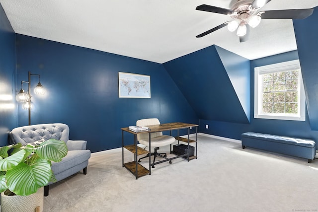 office area with carpet floors, baseboards, and ceiling fan