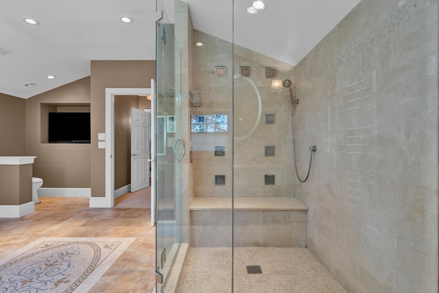 full bath with lofted ceiling, a shower stall, recessed lighting, toilet, and baseboards