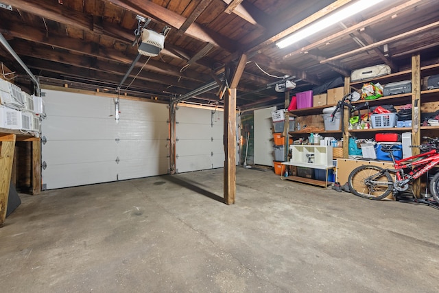 garage featuring a garage door opener