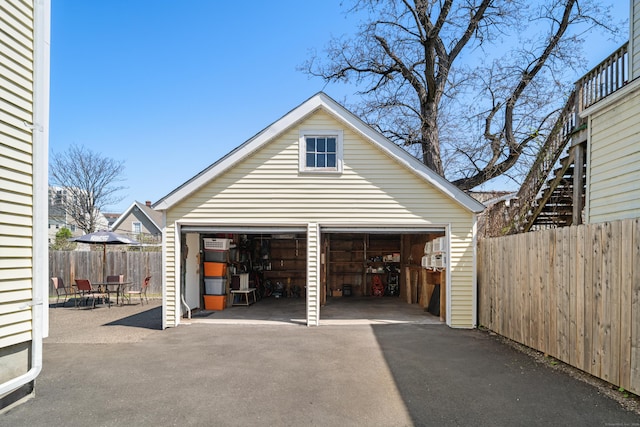 detached garage with fence