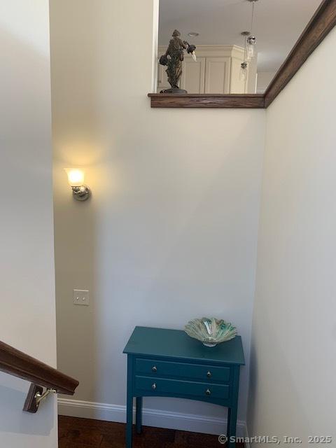 stairs featuring baseboards