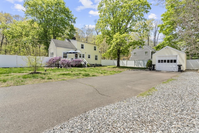 exterior space featuring aphalt driveway