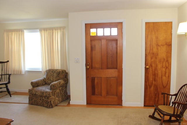 foyer entrance with baseboards