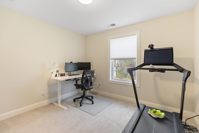 carpeted home office with baseboards and visible vents