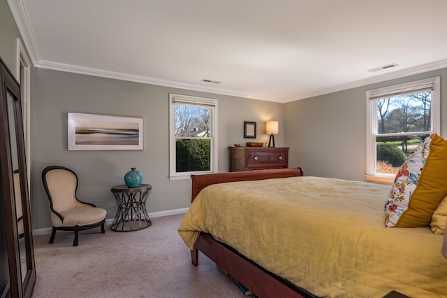 bedroom with visible vents, baseboards, ornamental molding, and carpet flooring