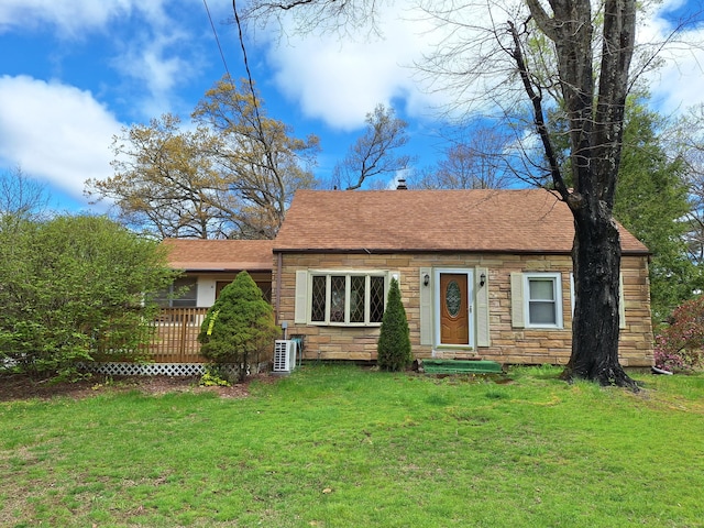 44 Old Plains Rd, Windham, CT 06226 - bungalow with roof with shingles, a wooden deck, a front lawn, and stone siding