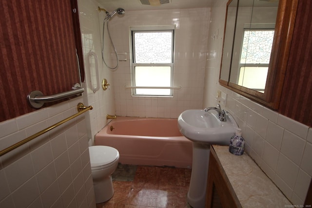44 Old Plains Rd, Windham, CT 06226 - full bathroom featuring toilet, tile walls, and shower / bathing tub combination