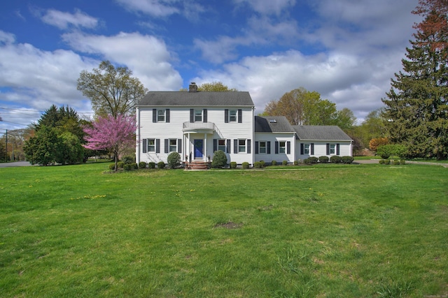 187 Sport Hill Rd, Easton, CT 06612 - colonial home featuring a front lawn and a chimney
