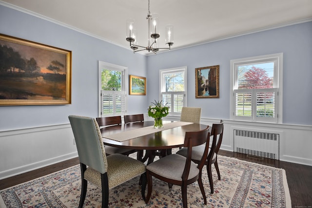 187 Sport Hill Rd, Easton, CT 06612 - dining area with a notable chandelier, radiator, a wainscoted wall, wood finished floors, and ornamental molding