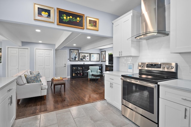 187 Sport Hill Rd, Easton, CT 06612 - kitchen featuring wall chimney range hood, stainless steel range with electric cooktop, open floor plan, and recessed lighting