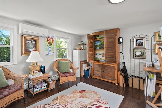 187 Sport Hill Rd, Easton, CT 06612 - sitting room featuring baseboard heating, a wall unit AC, and hardwood / wood-style floors