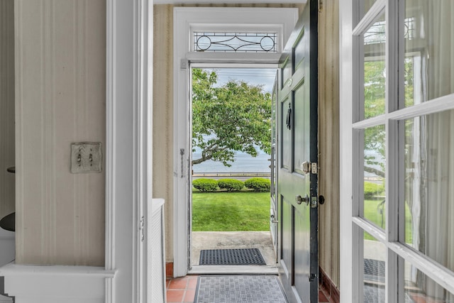 706 Ocean Ave, West Haven, CT 06516 - entryway with a water view and tile patterned flooring