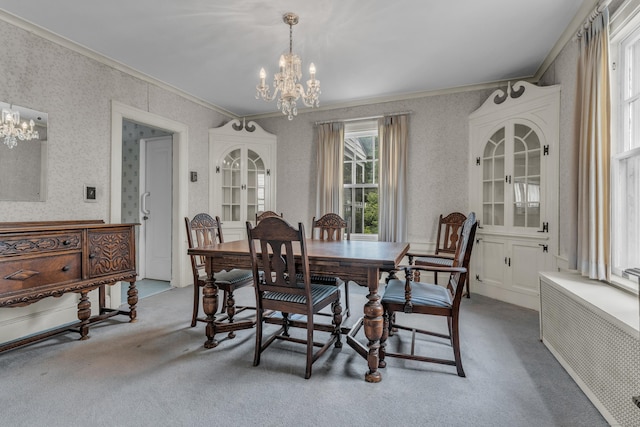 706 Ocean Ave, West Haven, CT 06516 - dining space with a chandelier, crown molding, radiator heating unit, carpet flooring, and wallpapered walls