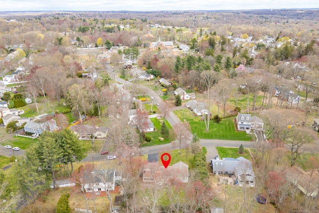 birds eye view of property with a residential view