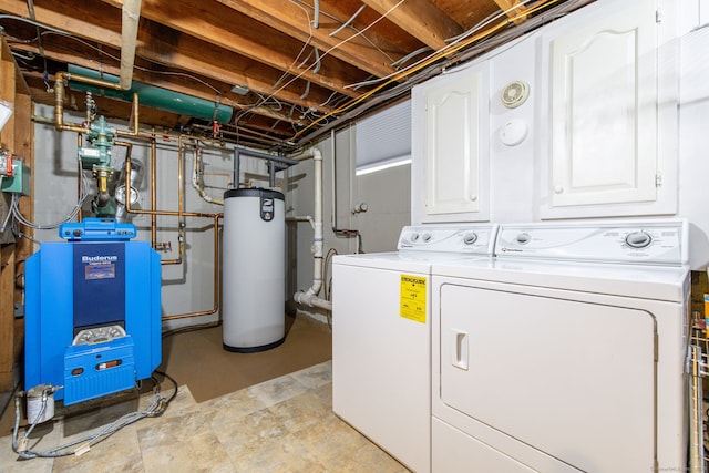 laundry area with laundry area, independent washer and dryer, and gas water heater