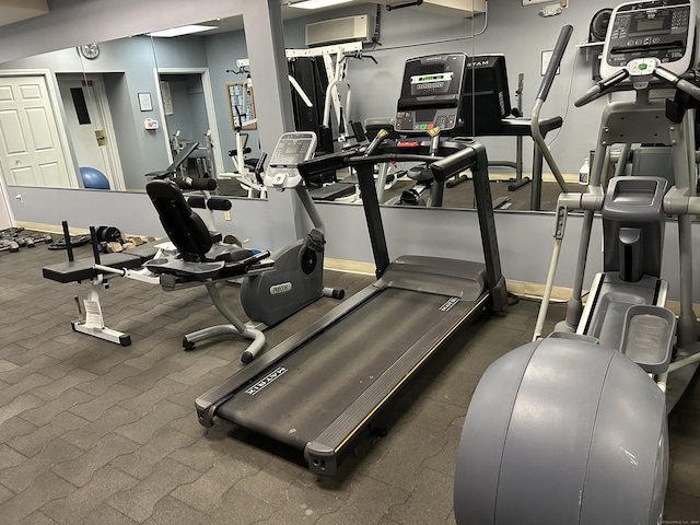 exercise room with baseboards