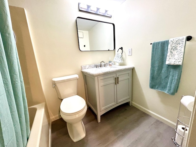full bathroom with toilet, baseboards, vanity, shower / bathtub combination with curtain, and wood finished floors