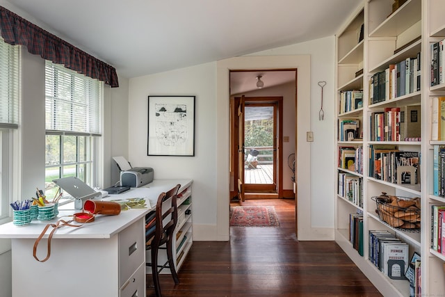 office featuring dark wood-type flooring, baseboards, and vaulted ceiling