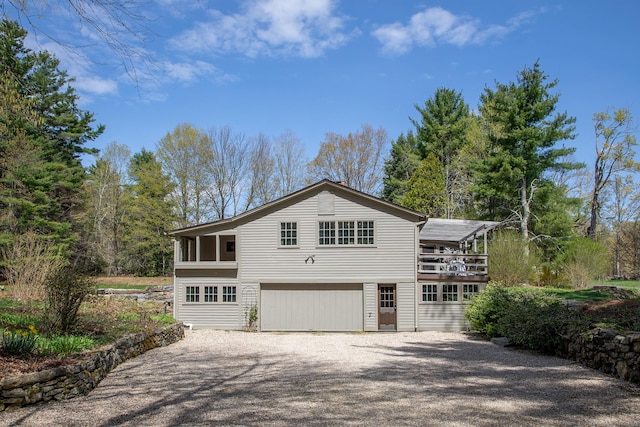 view of side of property featuring driveway