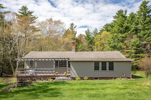 view of front facade featuring a wooden deck, a chimney, a pergola, and a front lawn