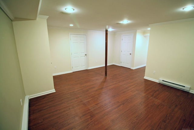 finished basement with crown molding, baseboard heating, wood finished floors, baseboards, and recessed lighting