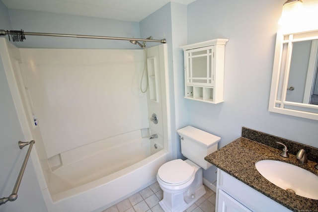 full bathroom with vanity, tile patterned floors, toilet, and tub / shower combination