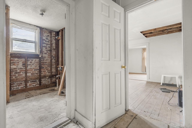 interior space featuring a textured ceiling