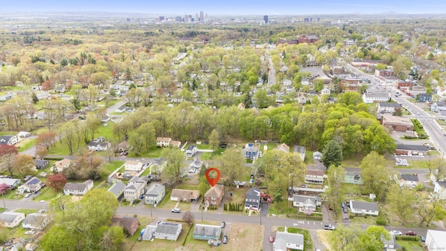 birds eye view of property with a residential view