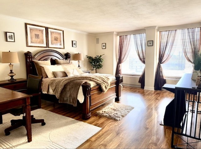 1 Gold St Unit 17De, Hartford, CT 06103 - bedroom featuring crown molding, wood finished floors, and baseboards