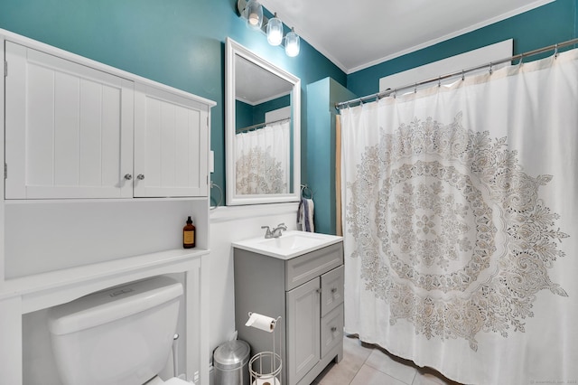 full bathroom with crown molding, vanity, tile patterned flooring, and toilet