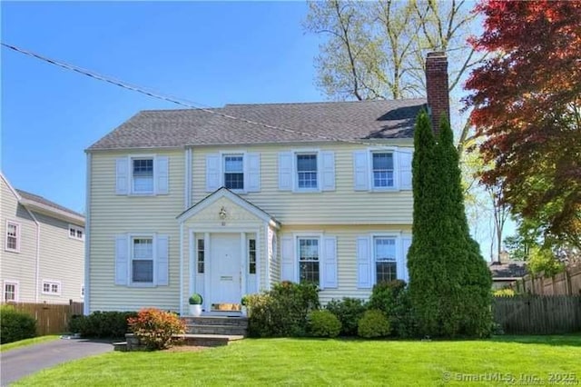 81 Southfield Rd, Fairfield, CT 06824 - view of front of house with a chimney