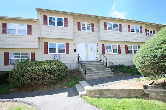 view of front of house with cooling unit
