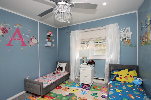 bedroom with crown molding and a ceiling fan