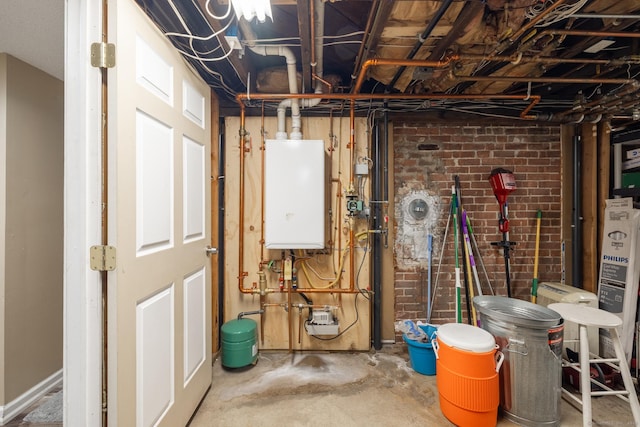 utility room featuring water heater