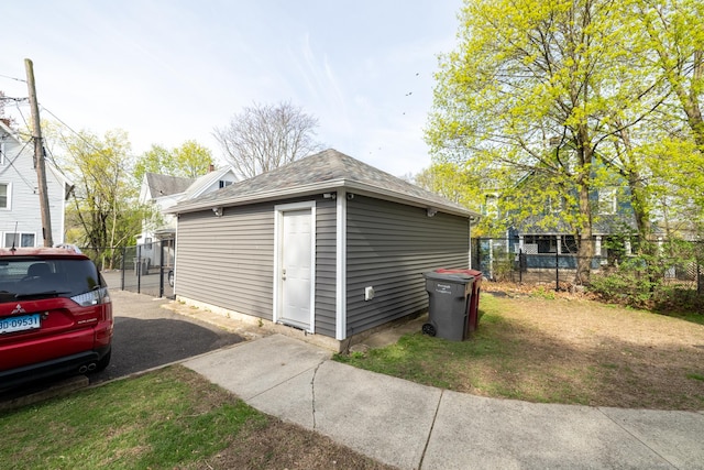 garage featuring fence