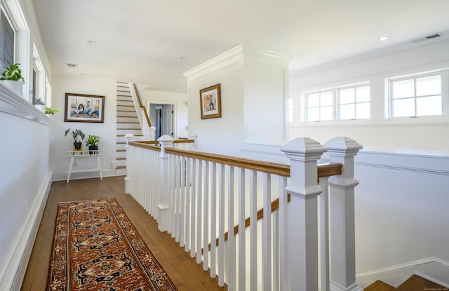 34 Knibloe Hill Rd, Sharon, CT 06069 - hall featuring dark wood-type flooring, visible vents, and an upstairs landing