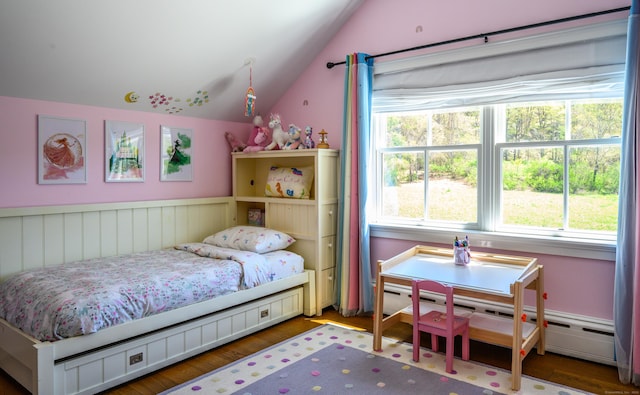 34 Knibloe Hill Rd, Sharon, CT 06069 - bedroom with a baseboard radiator, wainscoting, wood finished floors, and vaulted ceiling