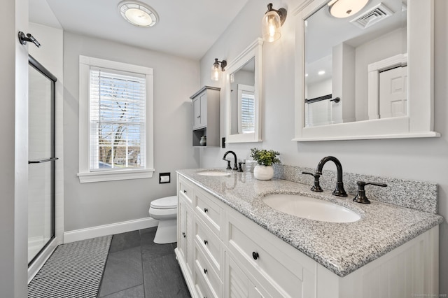 full bathroom featuring a sink, baseboards, toilet, and visible vents