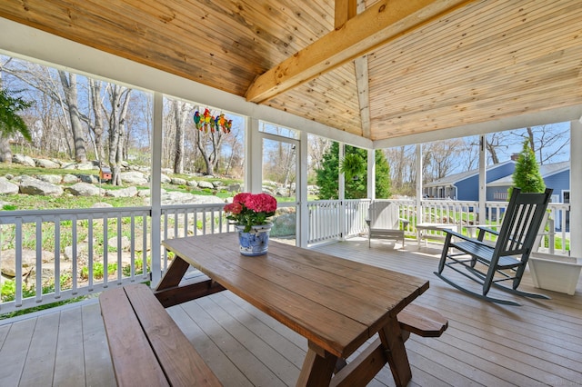 sunroom / solarium with beamed ceiling