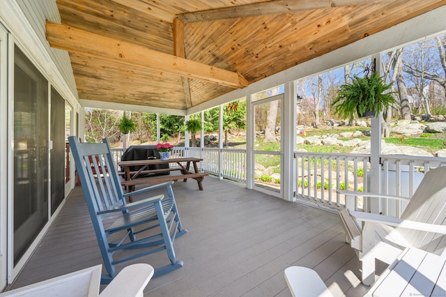 sunroom / solarium with beamed ceiling