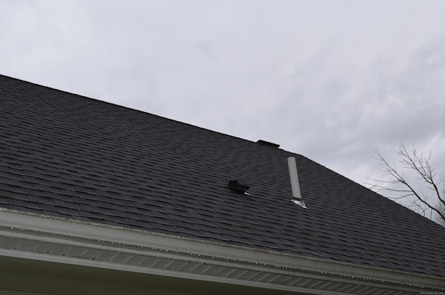 details featuring a shingled roof