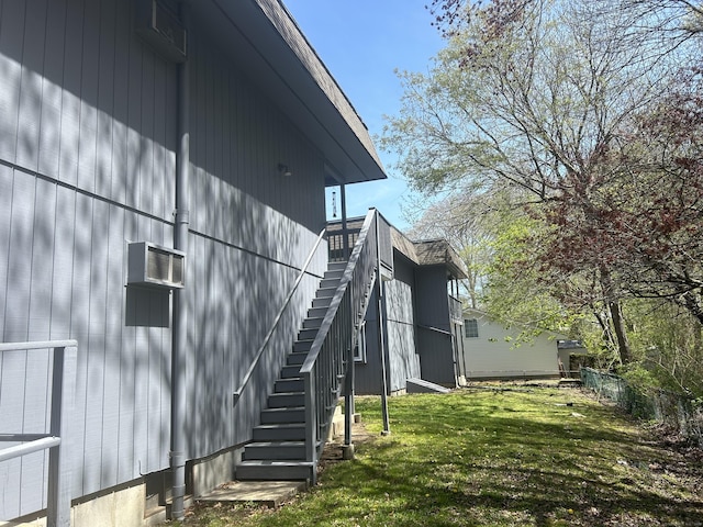 55 Virginia Ave Apt C, Groton, CT 06340 - view of side of home with stairway and a yard