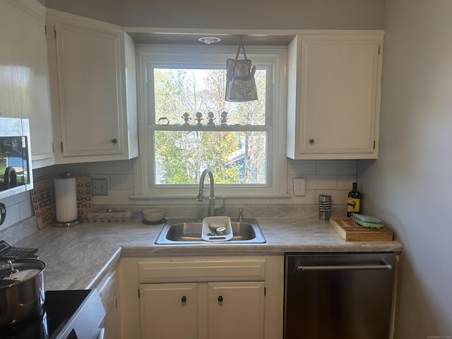 55 Virginia Ave Apt C, Groton, CT 06340 - kitchen featuring stainless steel appliances, a sink, light countertops, and white cabinets