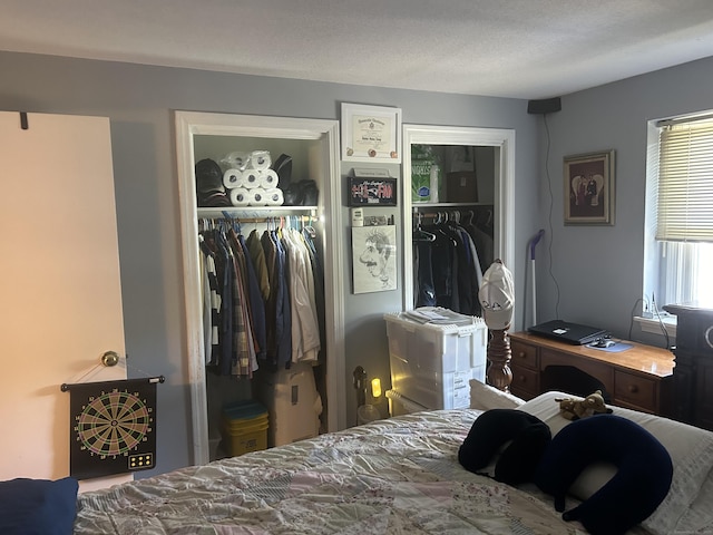 55 Virginia Ave Apt C, Groton, CT 06340 - bedroom featuring multiple closets