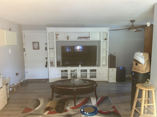 55 Virginia Ave Apt C, Groton, CT 06340 - living room with wood finished floors, ceiling fan, and baseboards