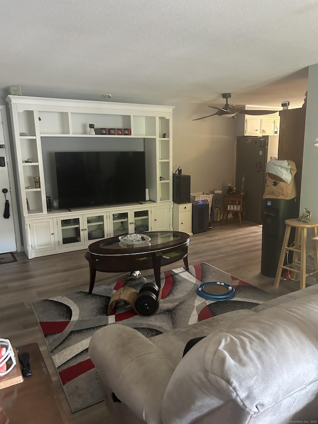 55 Virginia Ave Apt C, Groton, CT 06340 - living room featuring wood finished floors, ceiling fan, and a textured ceiling