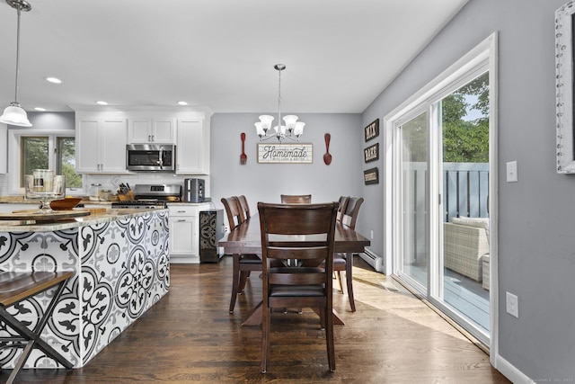 117 Mansfield Grove Rd, East Haven, CT 06512 - dining area featuring a baseboard heating unit, dark wood-style flooring, a chandelier, and recessed lighting