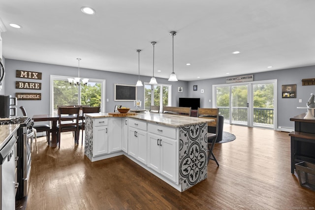 117 Mansfield Grove Rd, East Haven, CT 06512 - kitchen featuring gas stove, open floor plan, white cabinets, a baseboard radiator, and dark wood-style flooring